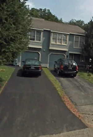 Sylvie had to meet Keith at 2 Flintlock [townhouse with the driveway on left]. It was now vacant because Keith, Mariana and Pam had moved from that townhouse to a larger home on Oregon Trail. Pam owned the townhouse. Keith had the keys and no one was living there at the time.