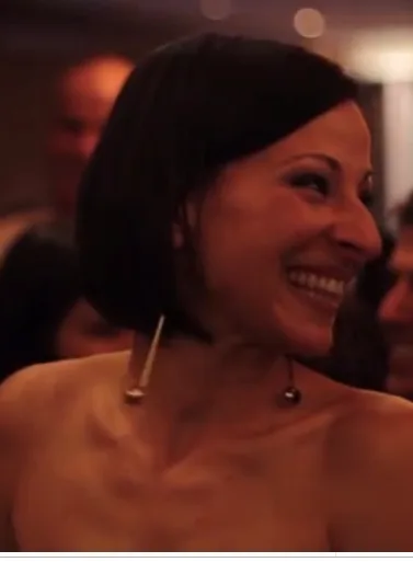 Who are the 12 women Raniere photographed nude in 2005?