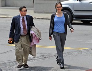 Clare Bronfman with her attorney William Savino. Savino drew up her verified complaint where she swore under oath that she had no written agreement with Parlato, which contradicts entirely the government's allegation that there was any written agreement. 
