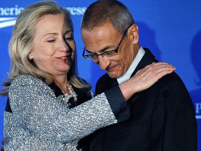 Hillary Clinton and John Podesta. Both had ties to Russia.