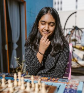Girl playing chessgirl playing chess artvoice