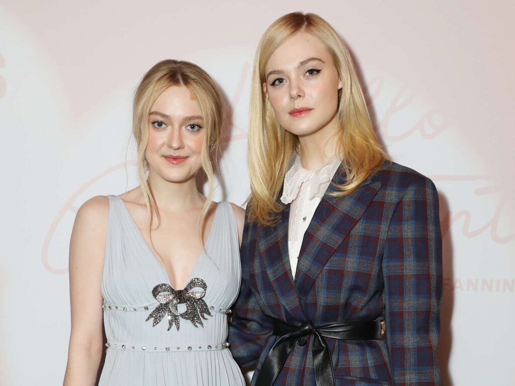 elle and dakota fanning at a red carpet event