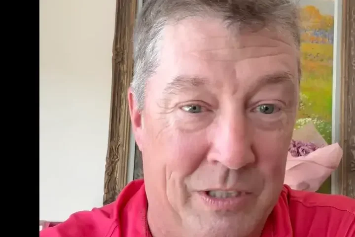 John Ziegler in a red shirt